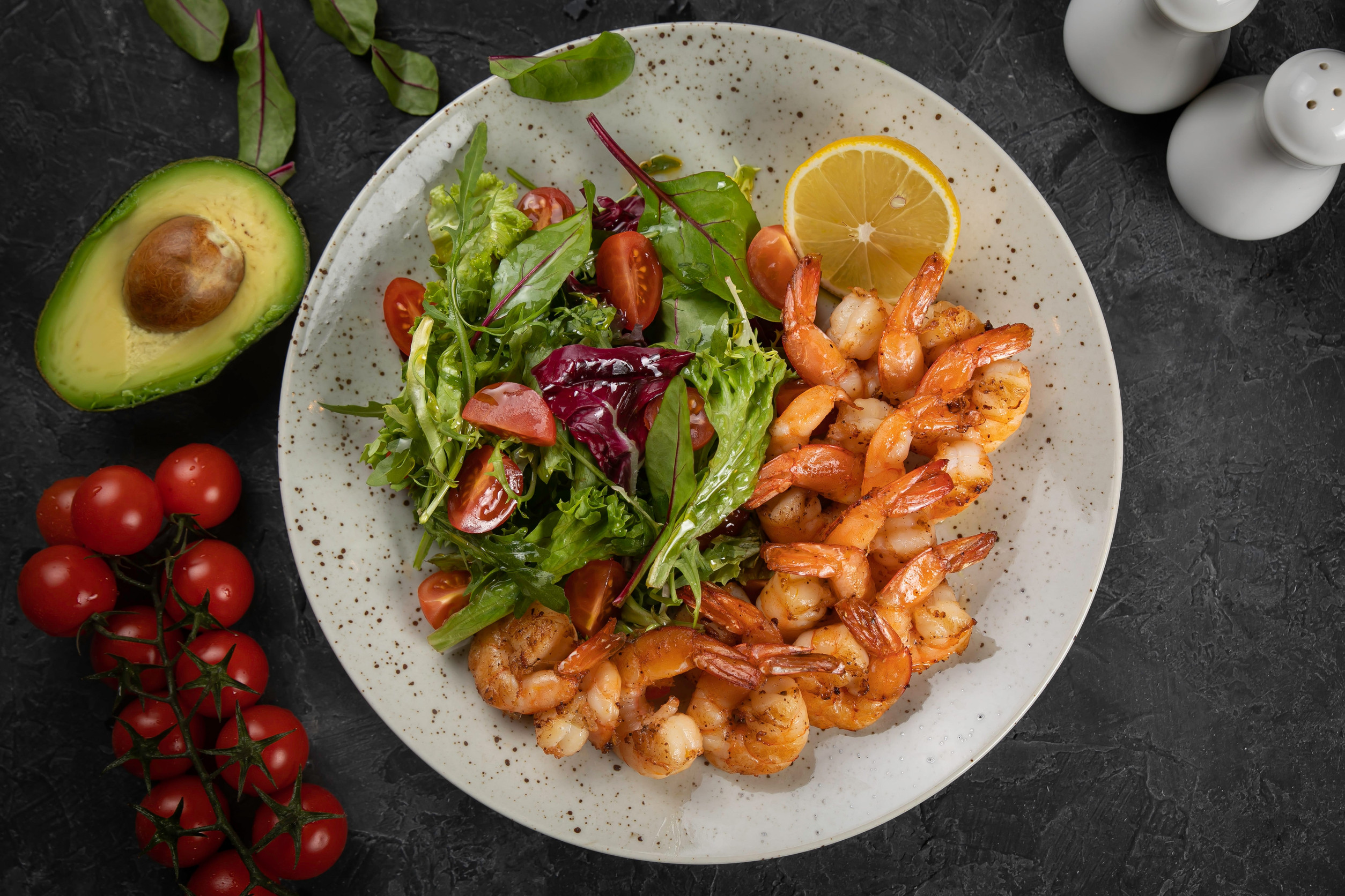 Fresh seafood served with green salad