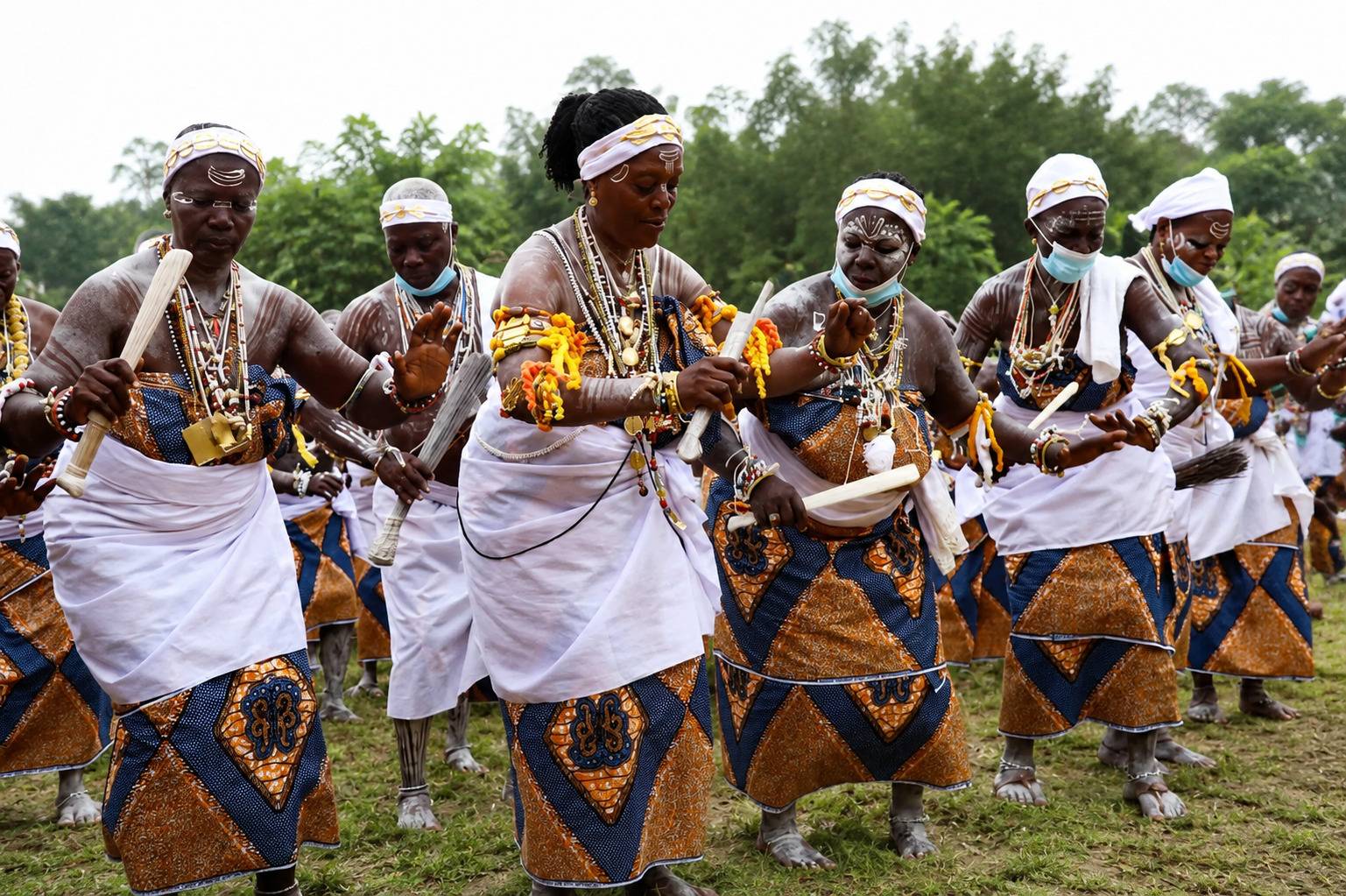 Ivorian Cultural Dancers In Traditional Attire