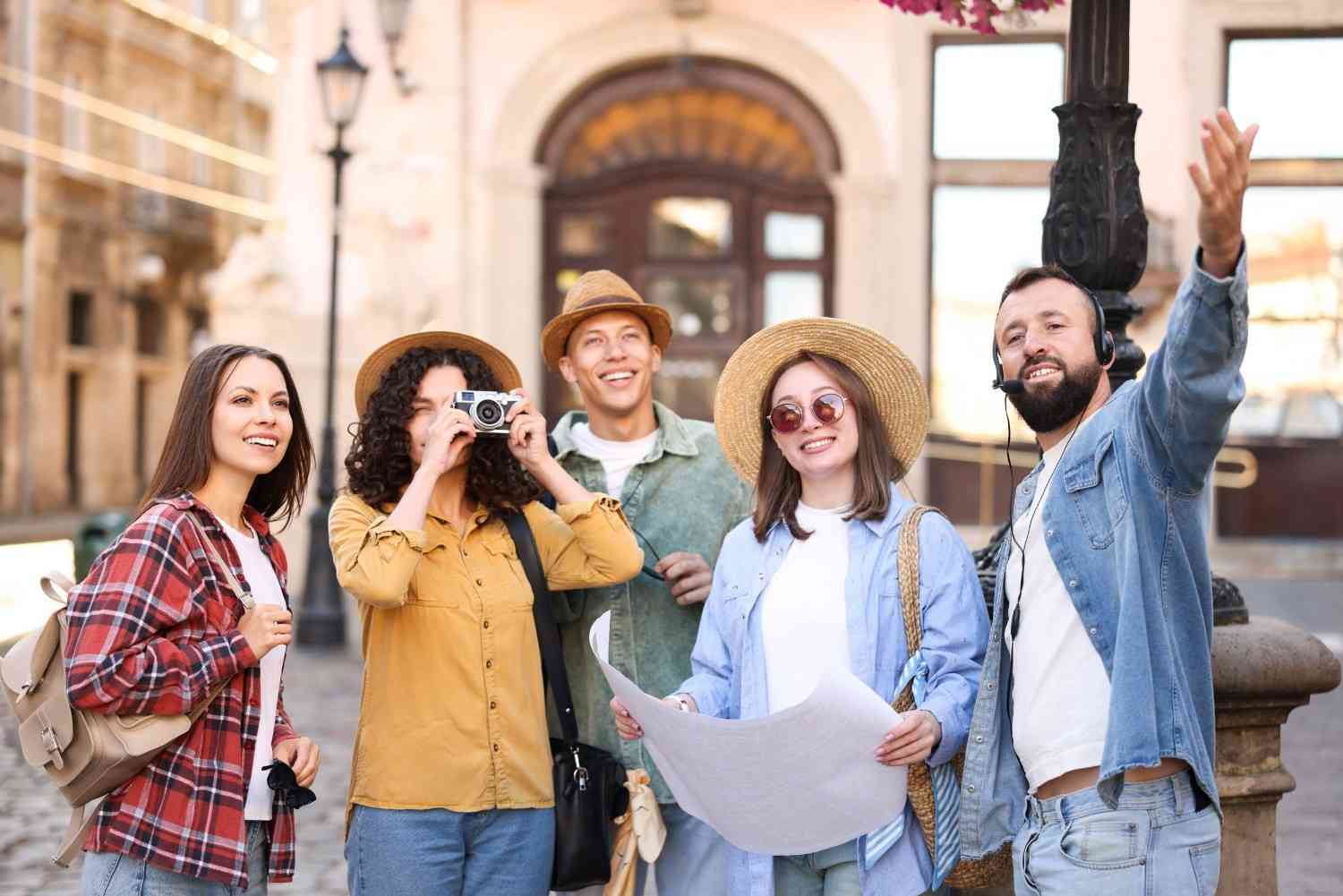 Tourists Exploring City On Guided Trip