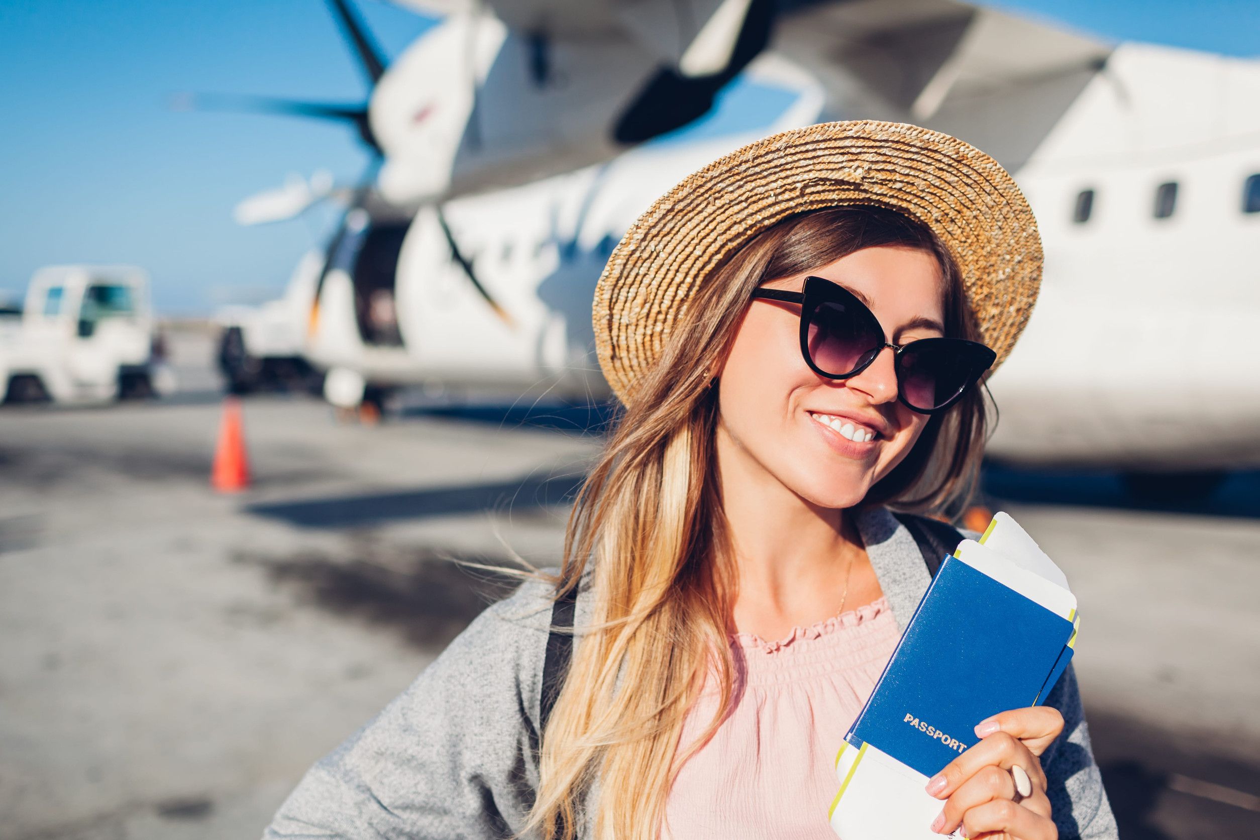 Woman Traveler Boarding On Plane Holding Passport Tickets