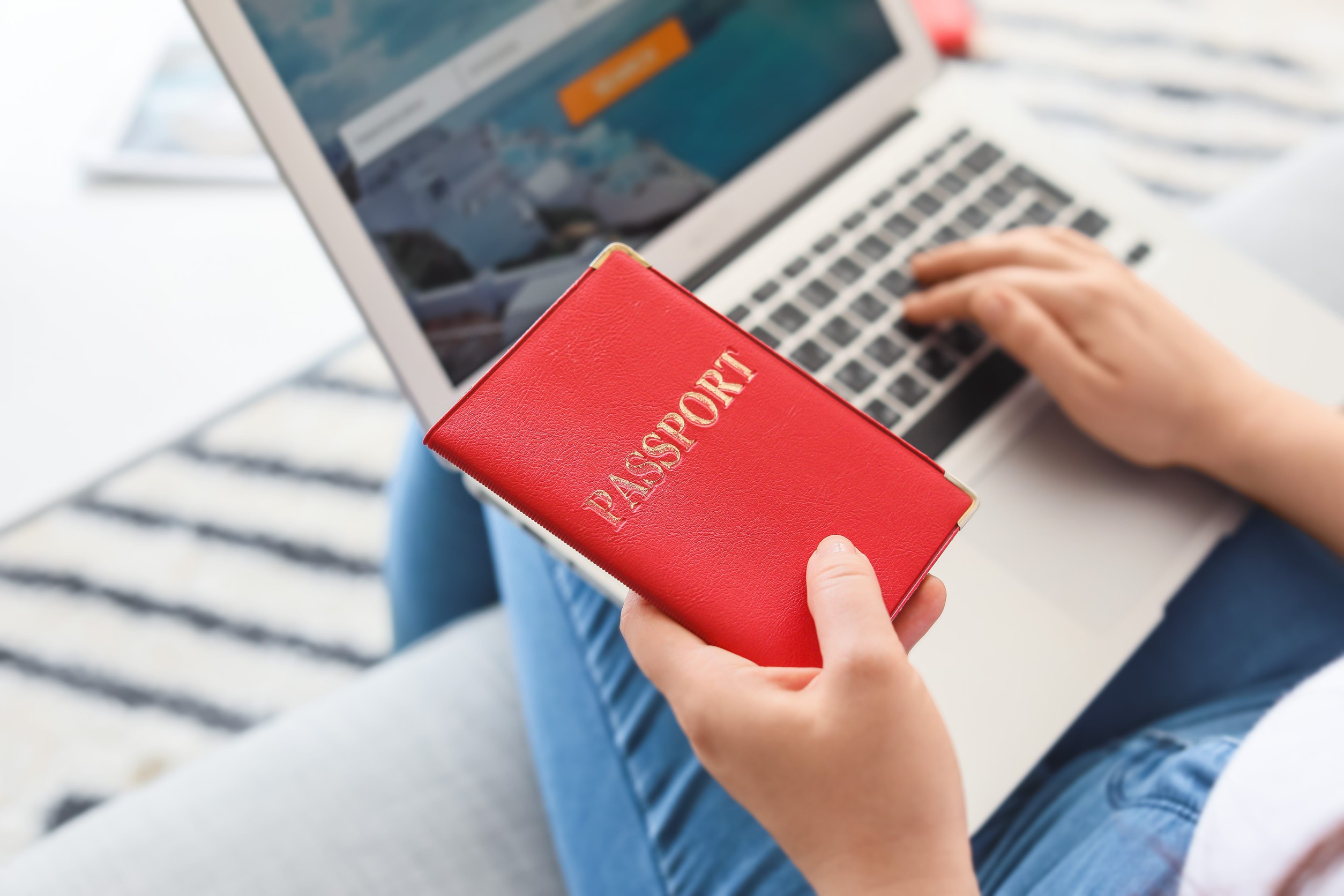 A Woman Booking Tickets Online At Home